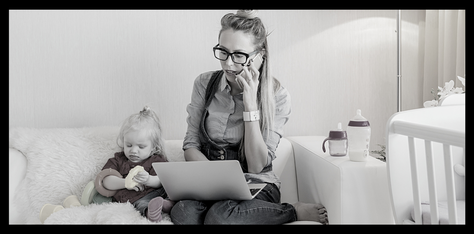 woman working from home with child
